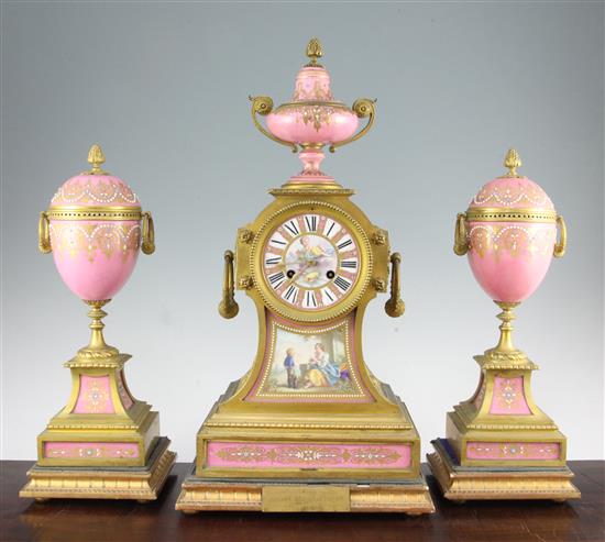A 19th century French ormolu and Sevres style porcelain clock garniture, clock 21in.